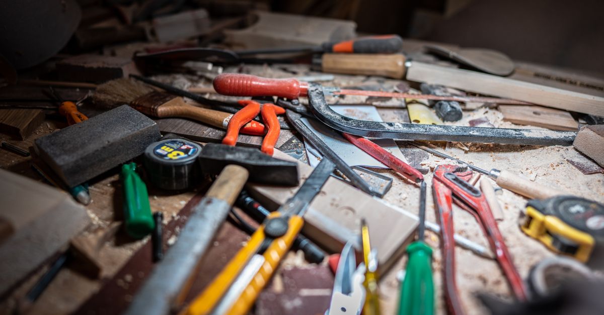 Workshop tools organized on a workbench for home repair projects